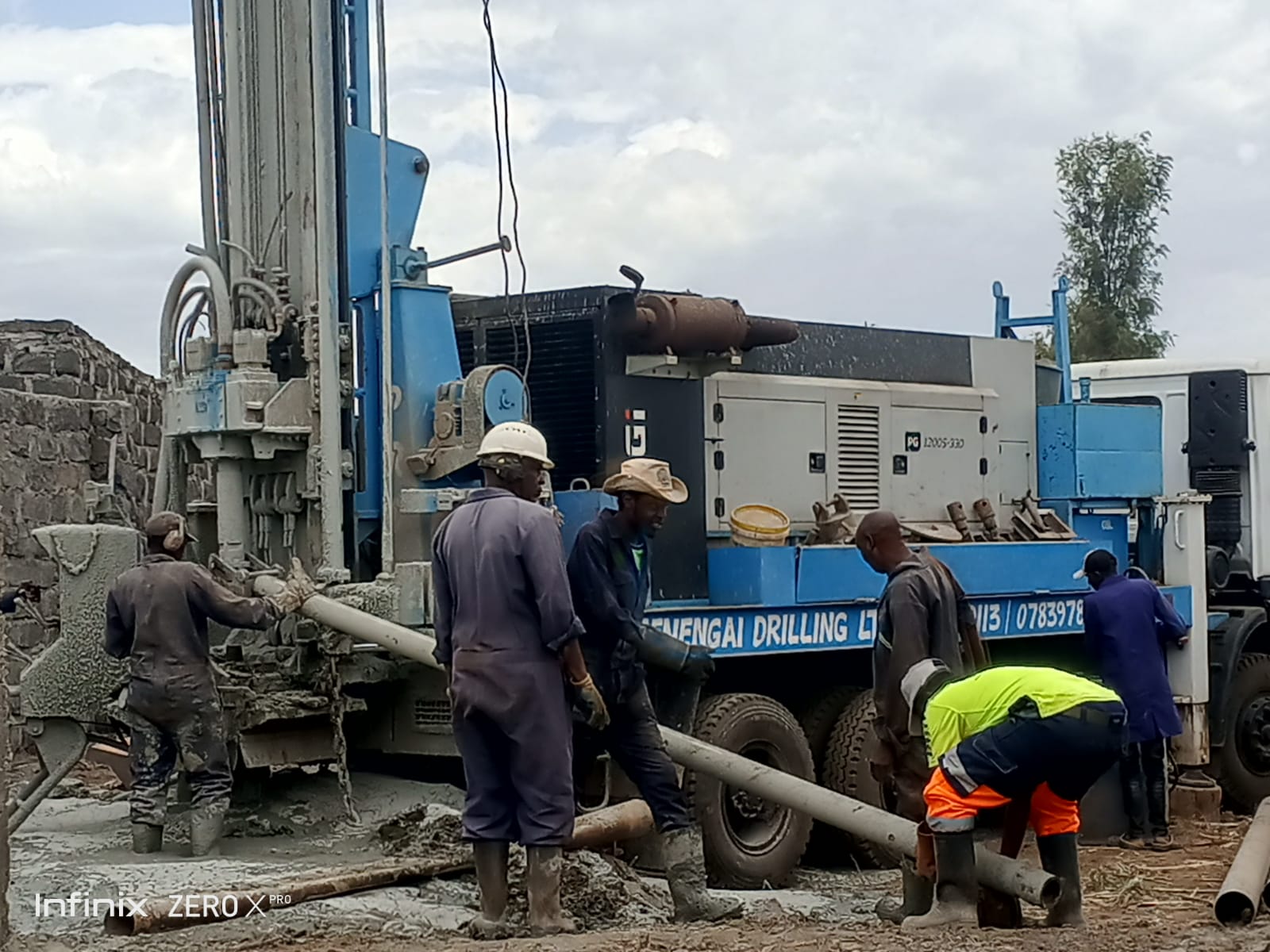 Borehole drilling rig operating in Nakuru using Down-The-Hole drilling technology for volcanic rock formations